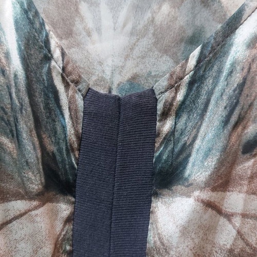 Dress with unique pattern and satin-like shine, size L, like new