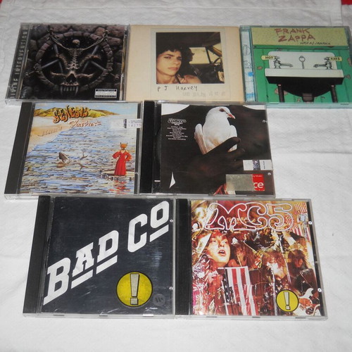 Lot of 7 used rock and metal CDs