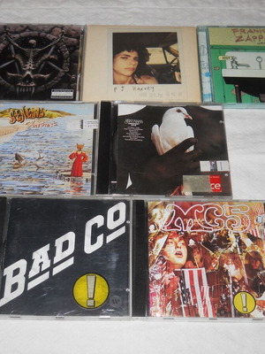 Lot of 7 used rock and metal CDs