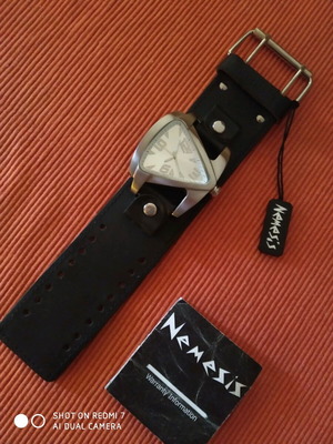 Nemesis wristwatch like new with leather strap and steel case