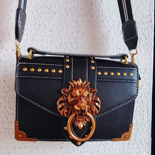 Black shoulder bag with lion design and rose gold details new