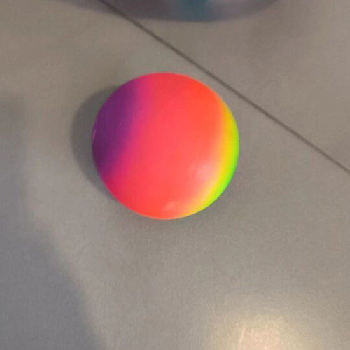 Inflatable beach ball and small plastic ball