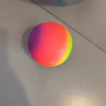 Inflatable beach ball and small plastic ball