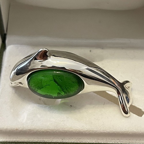 Christofle dolphin brooch with green stone