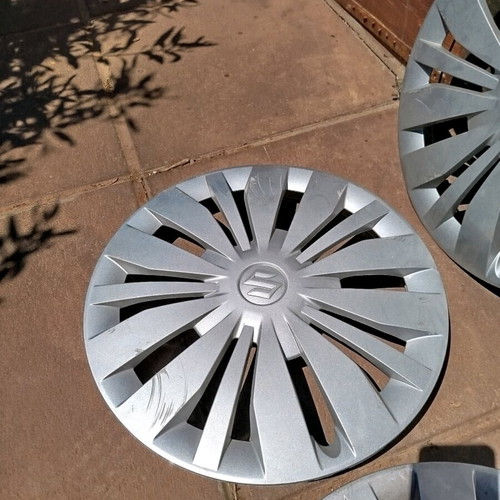 Suzuki Swift hubcaps used, set of 4 for 15 inch rims