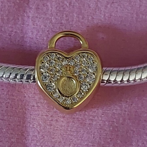 Charm stopper heart new, gold color with white zirconia and Pandora logo