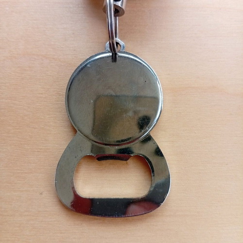 Corona Extra keychain bottle opener used with retractable strap