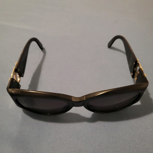 Yves Saint Laurent sunglasses used, black with gold logo