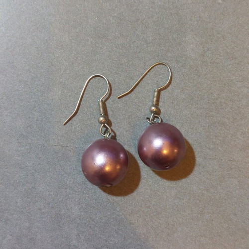 Dangling earrings used with purple and silver beads