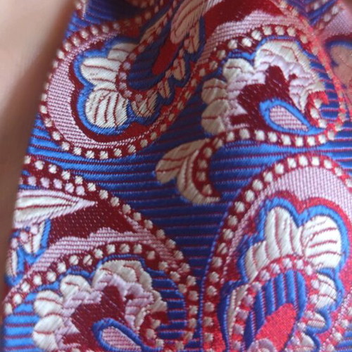 Silk tie new with unique paisley pattern, burgundy and blue