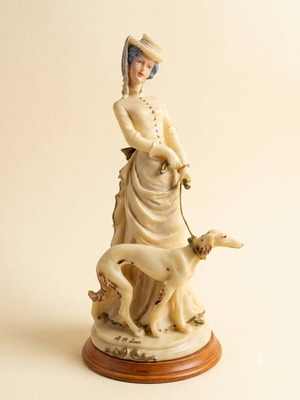 Vintage Auro Belcari figurine with Victorian woman and Borzoi dog, like new