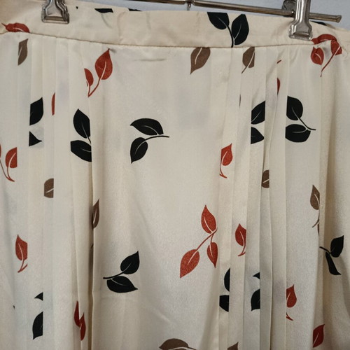 Beige blouse and pleated skirt set with leaf pattern, like new