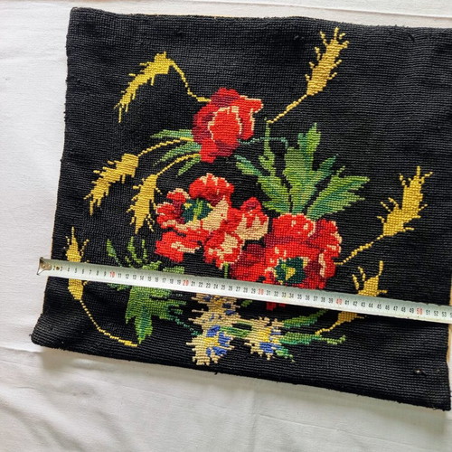 Vintage decorative sofa pillow with handmade embroidery and buttons used