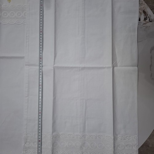 Vintage white linens with intricate cutwork embroidery, new