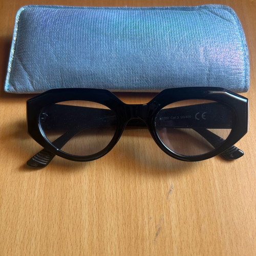 Pervedere sunglasses with black frame and slightly blue transparent lens like new