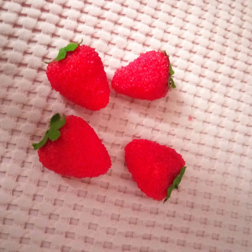 Decorative strawberries sold together