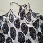Top with leaf print one size like new, black and white