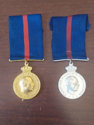 Set of meritorious service medals used, two together