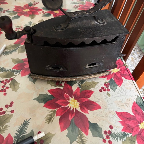 Iron with base and charcoal used