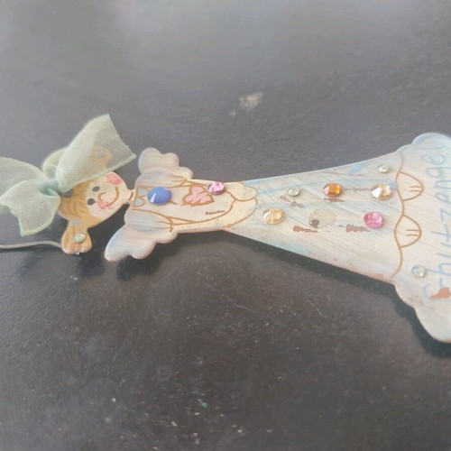 Single long earring used, about 8 cm