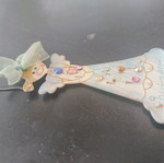 Single long earring used, about 8 cm
