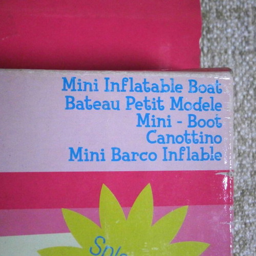 Barbie set of 4 inflatable boat, life buoy, swimming goggles, rackets new with box