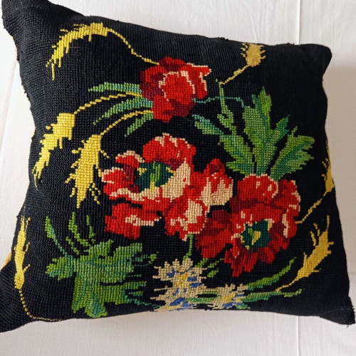 Vintage decorative sofa pillow with handmade embroidery and buttons used