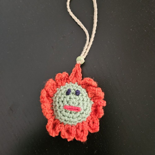 Handmade crochet flower charm decoration