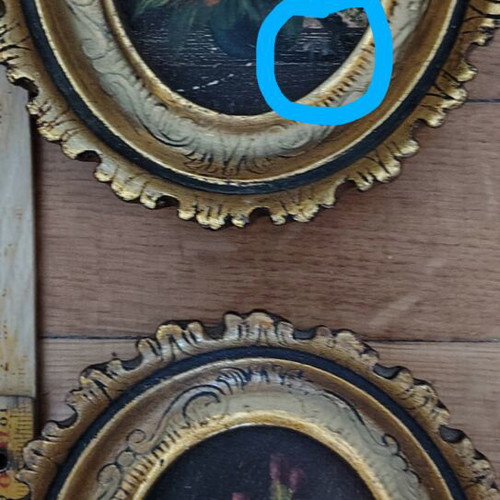 Pair of small oval paintings with embossed gold frames, like new