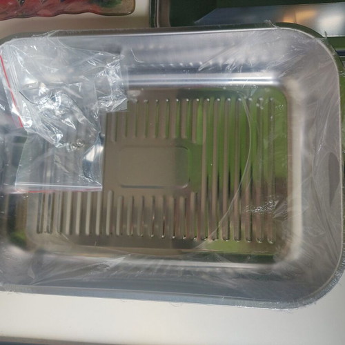 Metal tray new, practical for baking and cooking