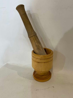 Wooden mortar with pestle used