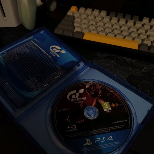 Keyboard and mouse used with Gran Turismo game