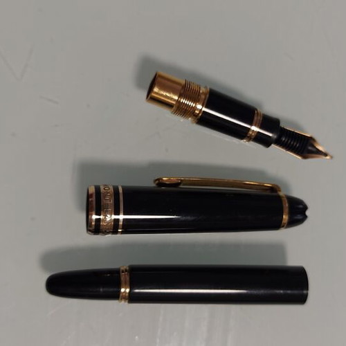 Mont Blanc Meisterstuck mini sized baby fountain pen with 14k gold nib and Mont Blanc men's lapel pin gift