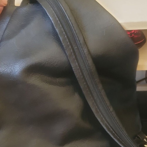 Black convertible sling bag backpack, synthetic leather, gold details