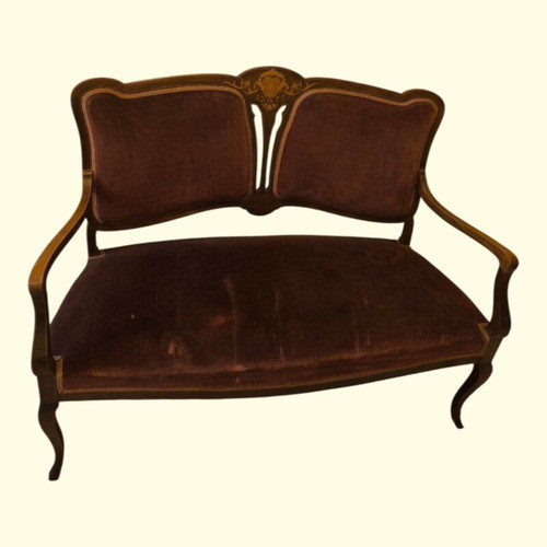 Vintage two-seater Victorian sofa used with detailed mosaics