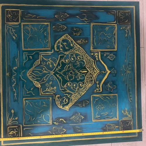 Turquoise board with a gold hamsa hand