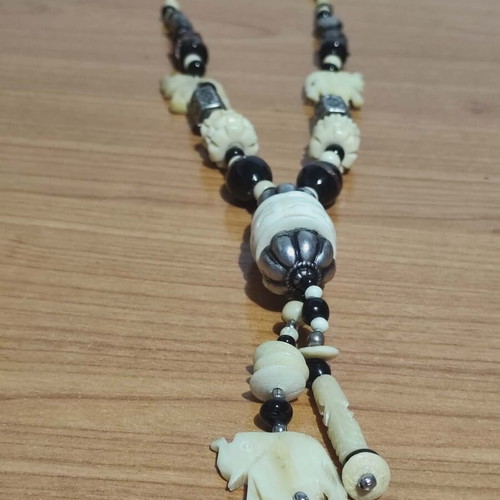 Bone necklace from camel like new, handmade carved