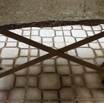CAST IRON TABLE WITH STONE SURFACE-