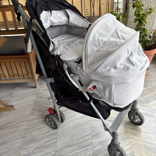 Maclaren Techno XLR stroller used with accessories and carrycot