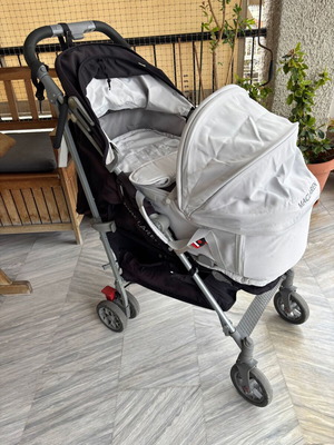 Maclaren Techno XLR stroller used with accessories and carrycot