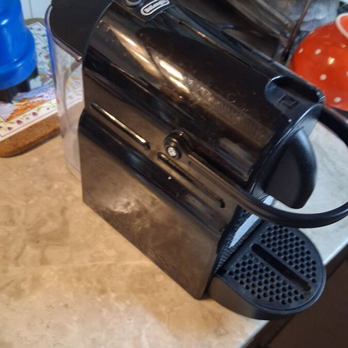 DeLonghi Inissia Nespresso capsule coffee machine with milk frother