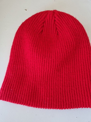 Knitted hat in bright red
