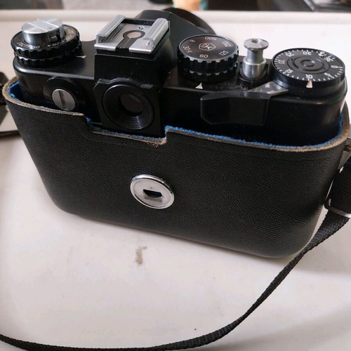 Zenit 12xp camera used with leather case