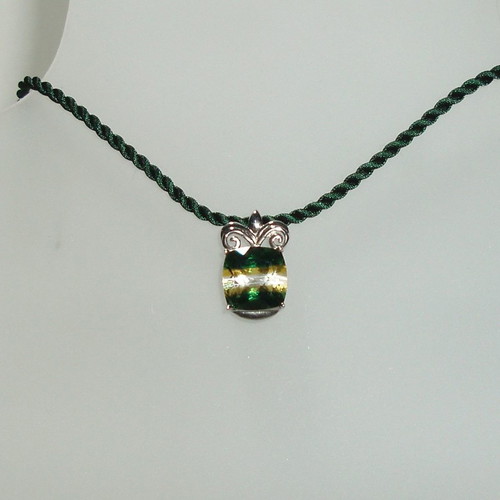 Platinum plated pendant with crystal new on silk cord