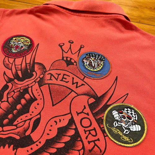 Ed Hardy men's orange polo shirt used with skull backprint