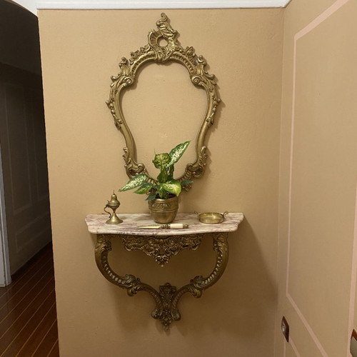 Console with framed mirror and marble used, baroque style