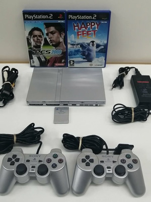 Playstation 2 Slim Silver SCPH-70004 като нов с 2 контролера и игри