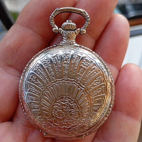 Dhalya pocket watch like new with intricate designs and new battery