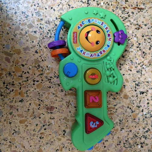 Fisher Price musical guitar used with English songs