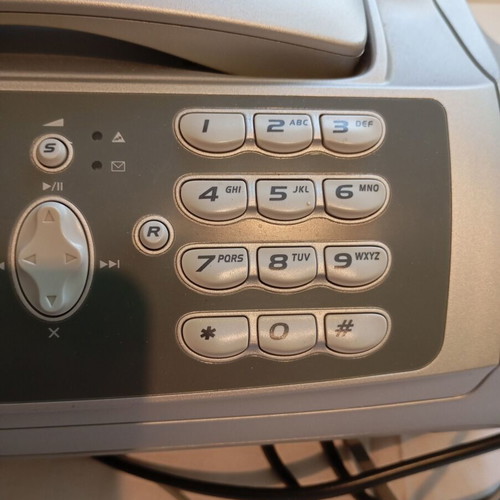 Olivetti Fax Lab 128 fax machine and landline phone used